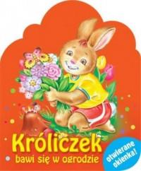 OTWIERANE OKIENKA. Króliczek bawi się