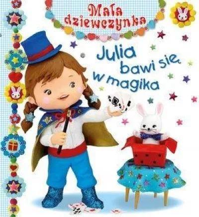 Mała dziewczynka - Julia bawi się w magika.